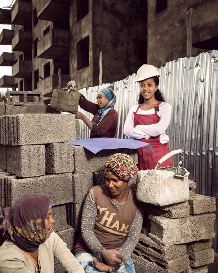 Helina, (center), 25, works for a real estate construction firm in Addis Ababa, the capital of Ethiopia. She is overseeing the construction of three apartment buildings